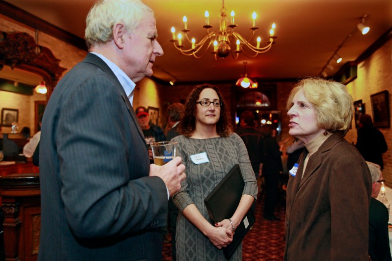 Milwaukee Mayor Tom Barrett and his communications director, Jodie Tabak, talk with Sue Walker at Buck Bradley's. Credit: Angela Peterson